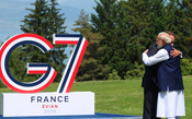 EVIAN, JUNE 16 (UNI):- President of France, Emmanuel Macron, welcomes Prime Minister Narendra Modi at the G7 Summit in Evian, France, on Tuesday. UNI PHOTO – S133U