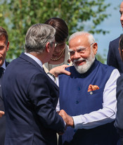 EVIAN, JUNE 16 (UNI):- Prime Minister Narendra Modi interacts with fellow leaders before the start of proceedings at the G7 Summit in Evian, France, on Tuesday. UNI PHOTO – S137U