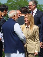 EVIAN, JUNE 16 (UNI):- Prime Minister Narendra Modi interacts with Italian Prime Minister Giorgia Meloni before the start of proceedings at the G7 Summit in Evian, France, on Tuesday. UNI PHOTO – S139U