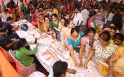 KOLKATA, JUNE 16 (UNI):- A large crowd gathers in North Kolkata to participate in the state’s mega Jan Kalyan Shivir outreach programme on Tuesday.  UNI PHOTO - S145U