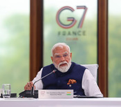 EVIAN, JUNE 16 (UNI):- Prime Minister Narendra Modi addresses fellow world leaders in the Outreach Session on 'Forging New Partnerships and Rebuilding International Solidarity'at the G7 Summit in Evian, France, on Tuesday. UNI PHOTO – S150U