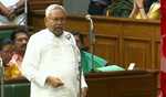 Nitish demands ban on using mobile phone in House