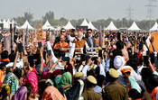 VARANASI, FEB 23 (UNI):-Prime Minister Narendra Modi receives warm welcome by people during the laying foundation stone of multiple development projects at Varanasi, in Uttar Pradesh on  Friday.UNI PHOTO-209U