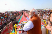 VARANASI, FEB 23 (UNI):-Prime Minister Narendra Modi receives warm welcome by people during the laying foundation stone of multiple development projects at Varanasi, in Uttar Pradesh on Friday.UNI PHOTO-211U