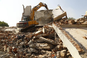AHMEDABAD, DEC 16 (UNI): JCB machines being used to demolish illegal residences near Sardar Vallabh Bhai Patel international Airport as part of the mega demolition drive by Ahmedabad Municipal Corporation (AMC), in Ahmedabad on Tuesday. UNI Photo 61U