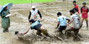 WAYANAD, July 15 (UNI) Wayanad Mud Festival Season-3 in progress at Valliyoorkavu at Wayanad distric in Kerala on Tuesday,UNI PHOTO 84U WAYANAD, July 15 (UNI) Wayanad Mud Festival Season-3 in progress at Valliyoorkavu at Wayanad distric in Kerala on Tuesday,UNI PHOTO 84U