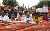 GUWAHATI, JULY, 15(UNI):-GUWAHATI, JULY, 15(UNI):- Dilip Saikia Assam State BJP president along with BJP party workers take out a rally at the GUWAHATI, JULY, 15(UNI):-GUWAHATI, JULY, 15(UNI):- Dilip Saikia Assam State BJP president along with BJP party workers take out a rally at the