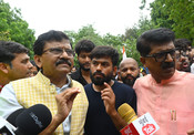 NEW DELHI, JULY 21 (UNI):-Shiv Sena (UBT) MP Sanjay Raut meets CJP founder Abhijit Dipke and supporters during a sit-in protest at Jantar Mantar, demanding the resignation of Union Education Minister Dharmendra Pradhan, in New Delhi on Tuesday. UNI PHOTO BY RD32U RANJAN DIMRI