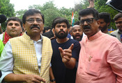 NEW DELHI, JULY 21 (UNI):-Shiv Sena (UBT) MP Sanjay Raut meets CJP founder Abhijit Dipke and supporters during a sit-in protest at Jantar Mantar, demanding the resignation of Union Education Minister Dharmendra Pradhan, in New Delhi on Tuesday. UNI PHOTO BY RD34U RANJAN DIMRI