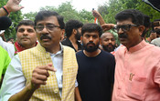 NEW DELHI, JULY 21 (UNI):-Shiv Sena (UBT) MP Sanjay Raut meets CJP founder Abhijit Dipke and supporters during a sit-in protest at Jantar Mantar, demanding the resignation of Union Education Minister Dharmendra Pradhan, in New Delhi on Tuesday. UNI PHOTO BY RD35U RANJAN DIMRI