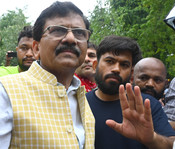 NEW DELHI, JULY 21 (UNI):-Shiv Sena (UBT) MP Sanjay Raut meets CJP founder Abhijit Dipke and supporters during a sit-in protest at Jantar Mantar, demanding the resignation of Union Education Minister Dharmendra Pradhan, in New Delhi on Tuesday. UNI PHOTO BY RD37U RANJAN DIMRI
