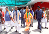 LUCKNOW, APR 29 (UNI):- Defence Minister Rajnath Singh with Uttar Pradesh Chief Minister Yogi Adityanath and Uttarakhand Chief Minister Pushkar Singh Dhami arrives to file his nomination for the Lok Sabha Elections, in Lucknow on Monday. UNI PHOTO-22U